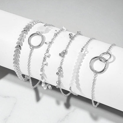 Boho Chic Apyrankių Rinkinys – Sluoksniuota Elegancija su Prasmė