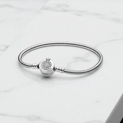 Spindinčioji Crown Snake Chain Apyrankė – Laiko Nepavaldus Prabangos Akcentas