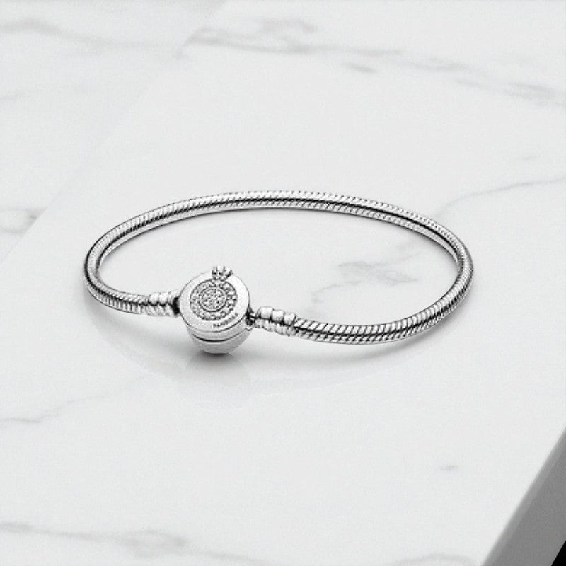 Spindinčioji Crown Snake Chain Apyrankė – Laiko Nepavaldus Prabangos Akcentas