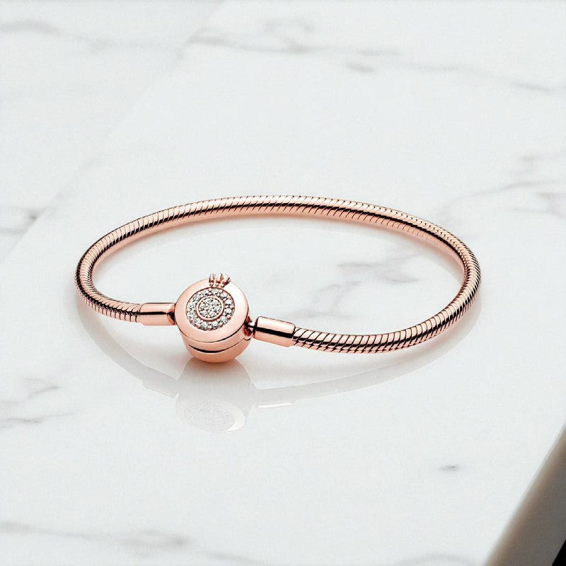 Spindinčioji Crown Snake Chain Apyrankė – Laiko Nepavaldus Prabangos Akcentas